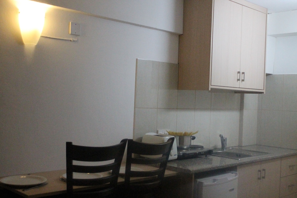 A. Maos Hotel Apartments 34/62