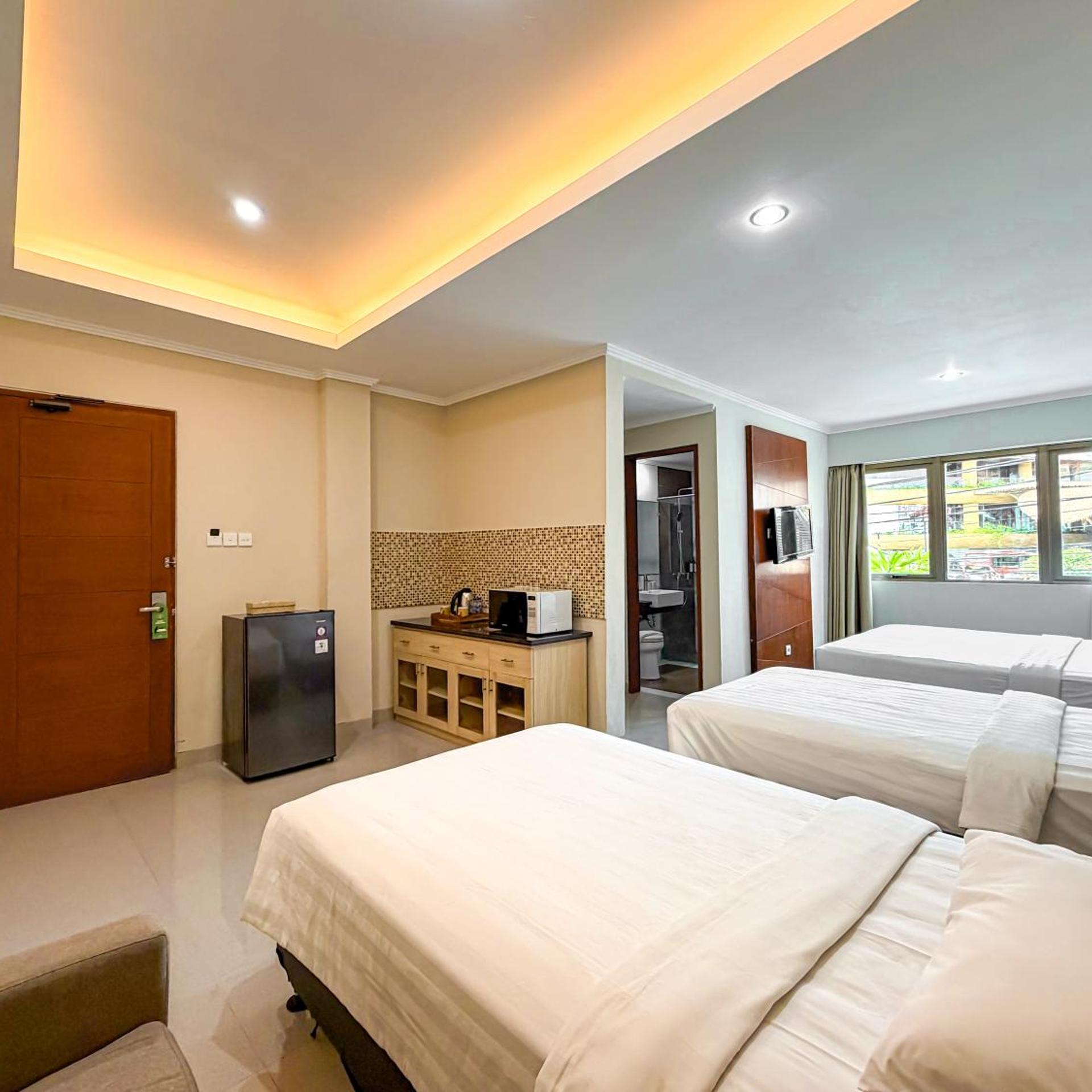 غرفة عائلية بسرير فردي، Svarna Hotel Sanur 2/7