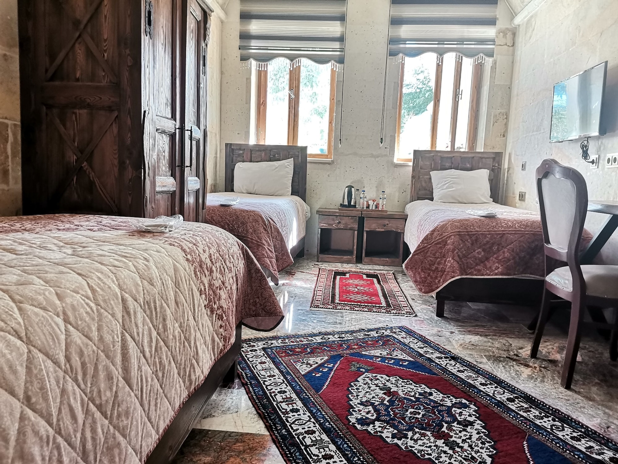 غرفة حصرية ثلاثية بسرير كوين وسرير فردي بإطلالة على الحديقة، Lucky Cave Cappadocia 2/3