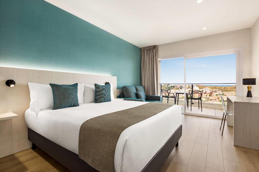 Luxury, Queen Bed, Sea View, Sofa, Ramada Resort by Wyndham Puerto de Mazarron 2/3