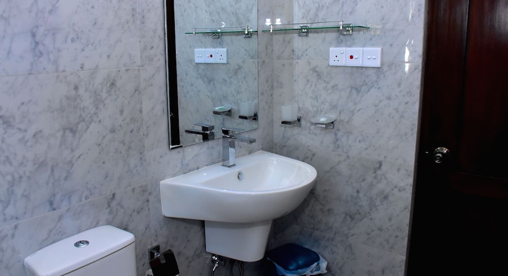 غرفة ديلوكس بسرير كينج بإطلالة على الحديقة، Nine Arch Holiday Resort 7/8