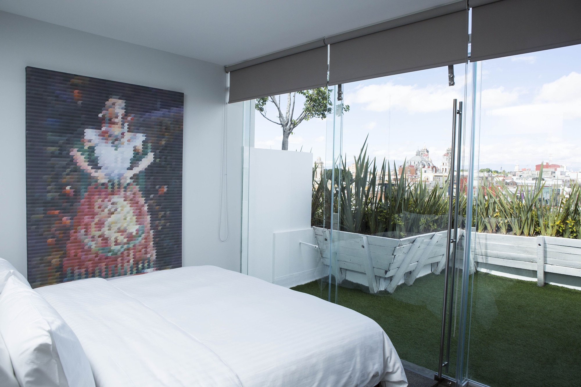 غرفة ديلوكس بسرير كينج بشرفة، Ikonik Hotel Puebla 6/10