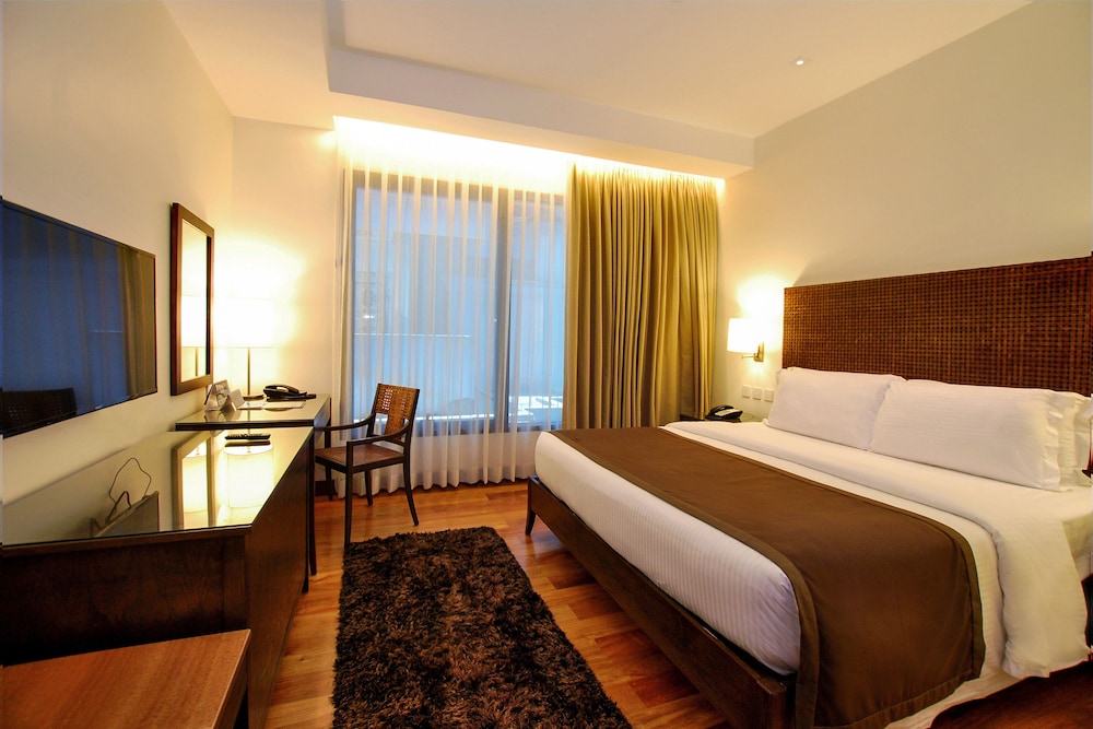غرفة ديلوكس بسرير كينج، City Garden Grand Hotel 3/10