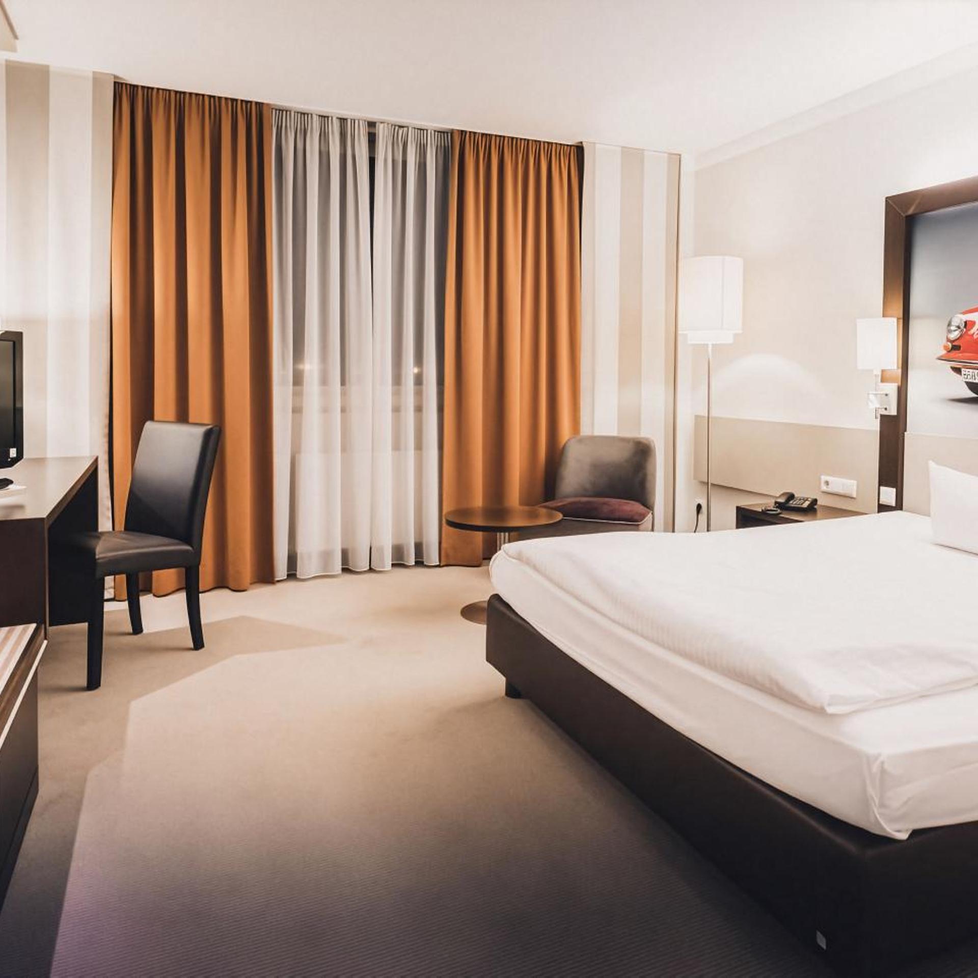غرفة اقتصادية بسرير كينج وسرير كوين، elaya Hotel Stuttgart Ludwigsburg, Trademark by Wyndham 8/10