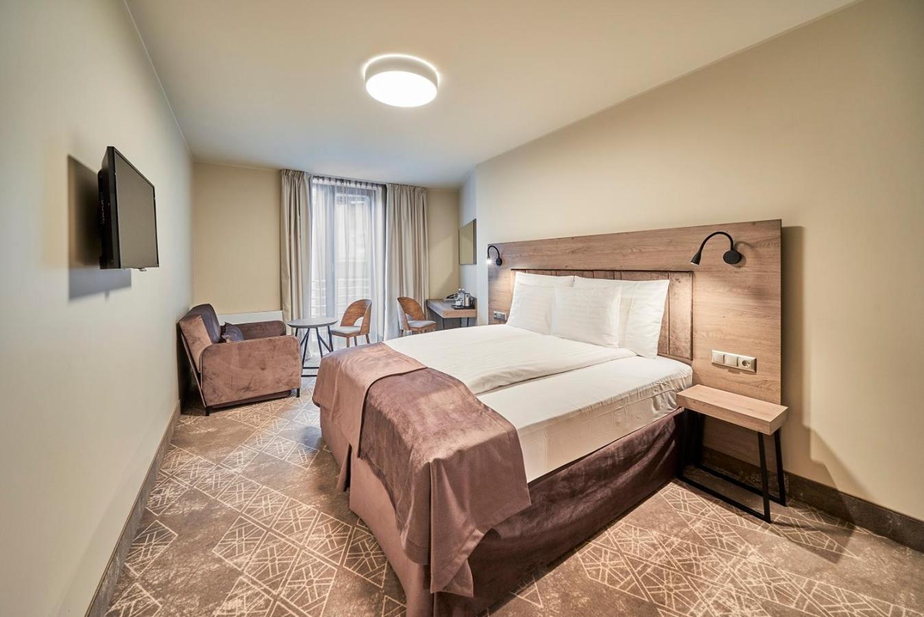 غرفة قياسية بسرير مزدوج أو سريرين منفصلين مع أريكة، Wellton Riverside SPA Hotel 5/10