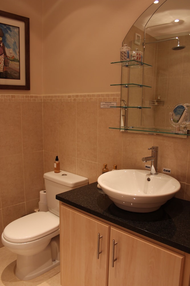 غرفة بسرير فردي بإطلالة على الجبل، Riversong Guest House 6/8