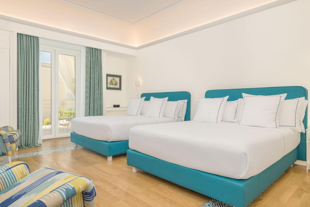 1 Bedroom, Magnolia, Junior Suite, 2 Queen Beds, Garden View, Balcony