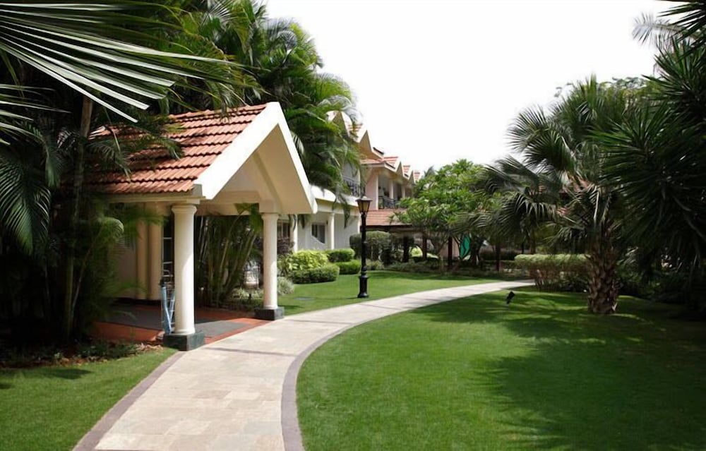 Palm Meadows Resort 63/67