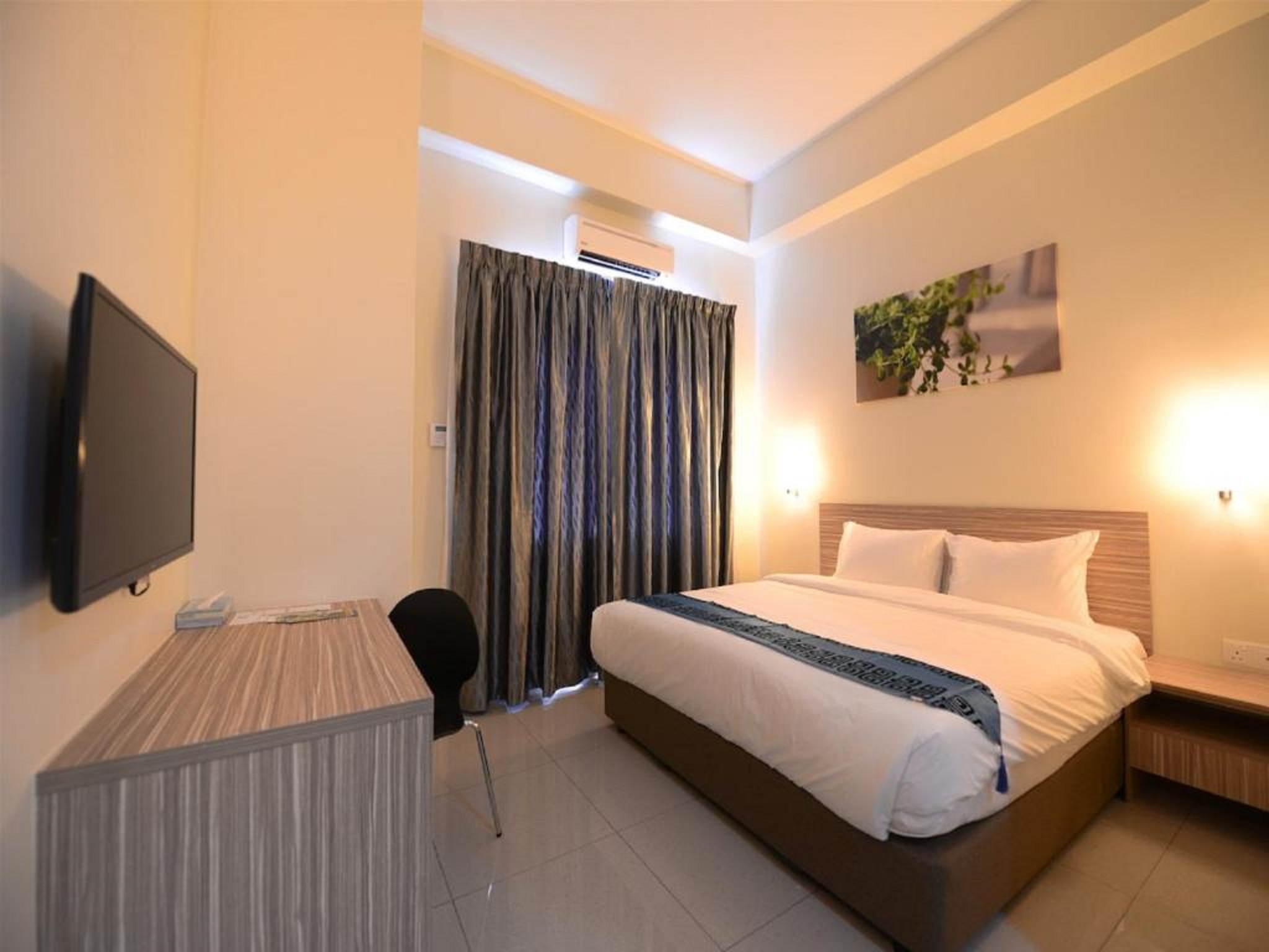 Deluxe Quad Room