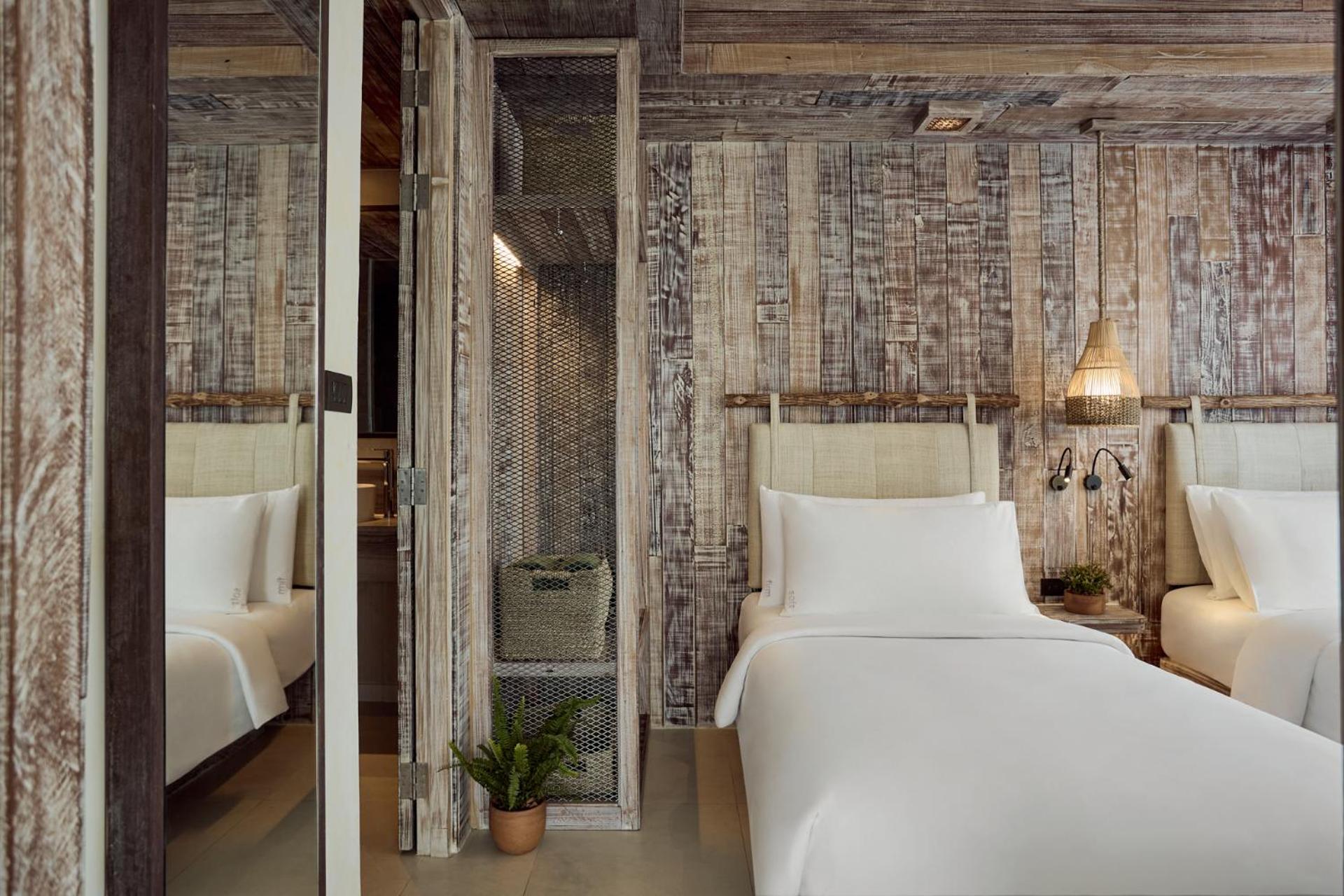 جناح ركني بسرير كينج وسرير فردي بغرفتي نوم، Dinso Resort 7/8