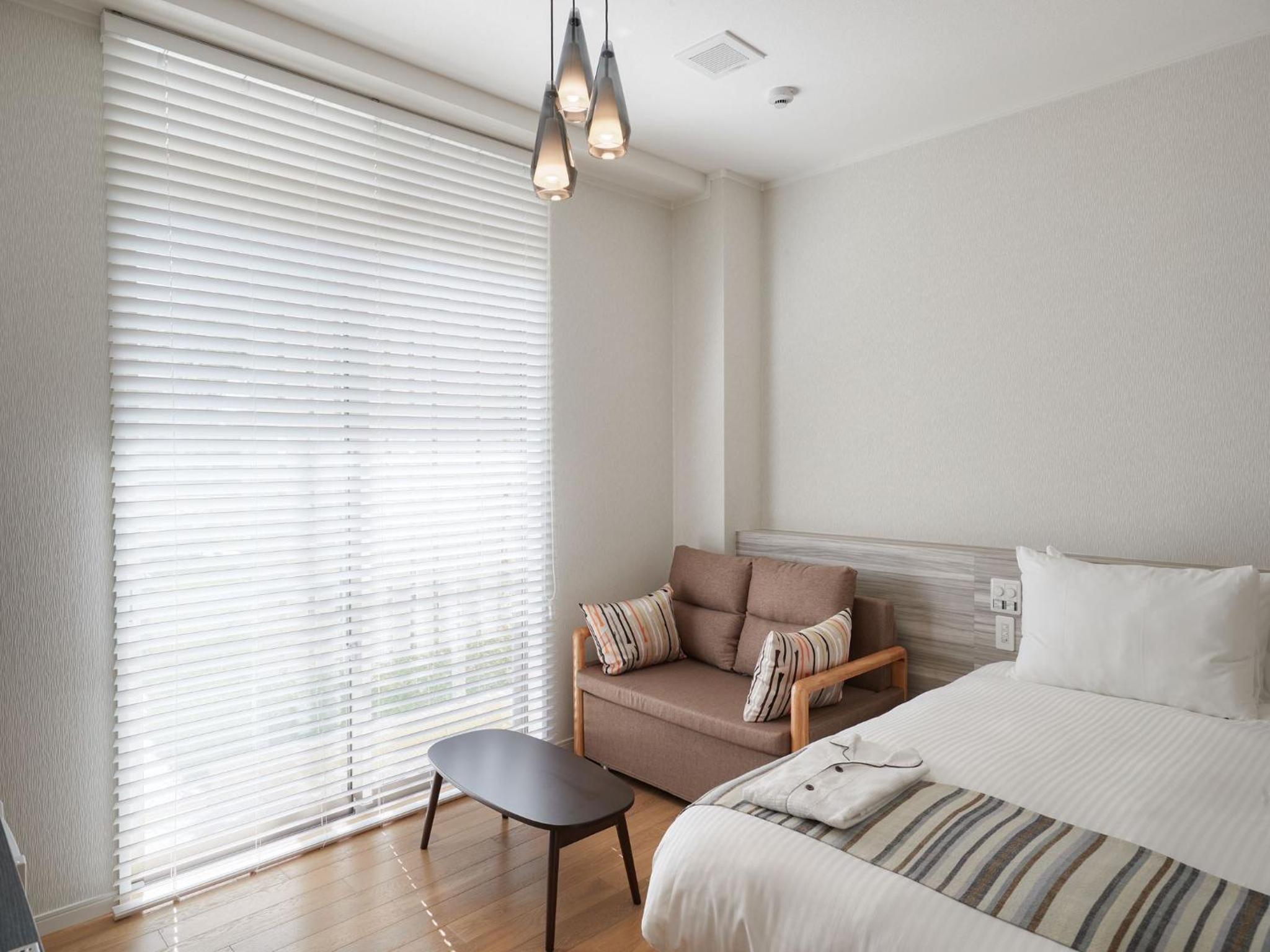 غرفة بسريرين منفصلين، La Casa Panacea Okinawa Resort 10/10