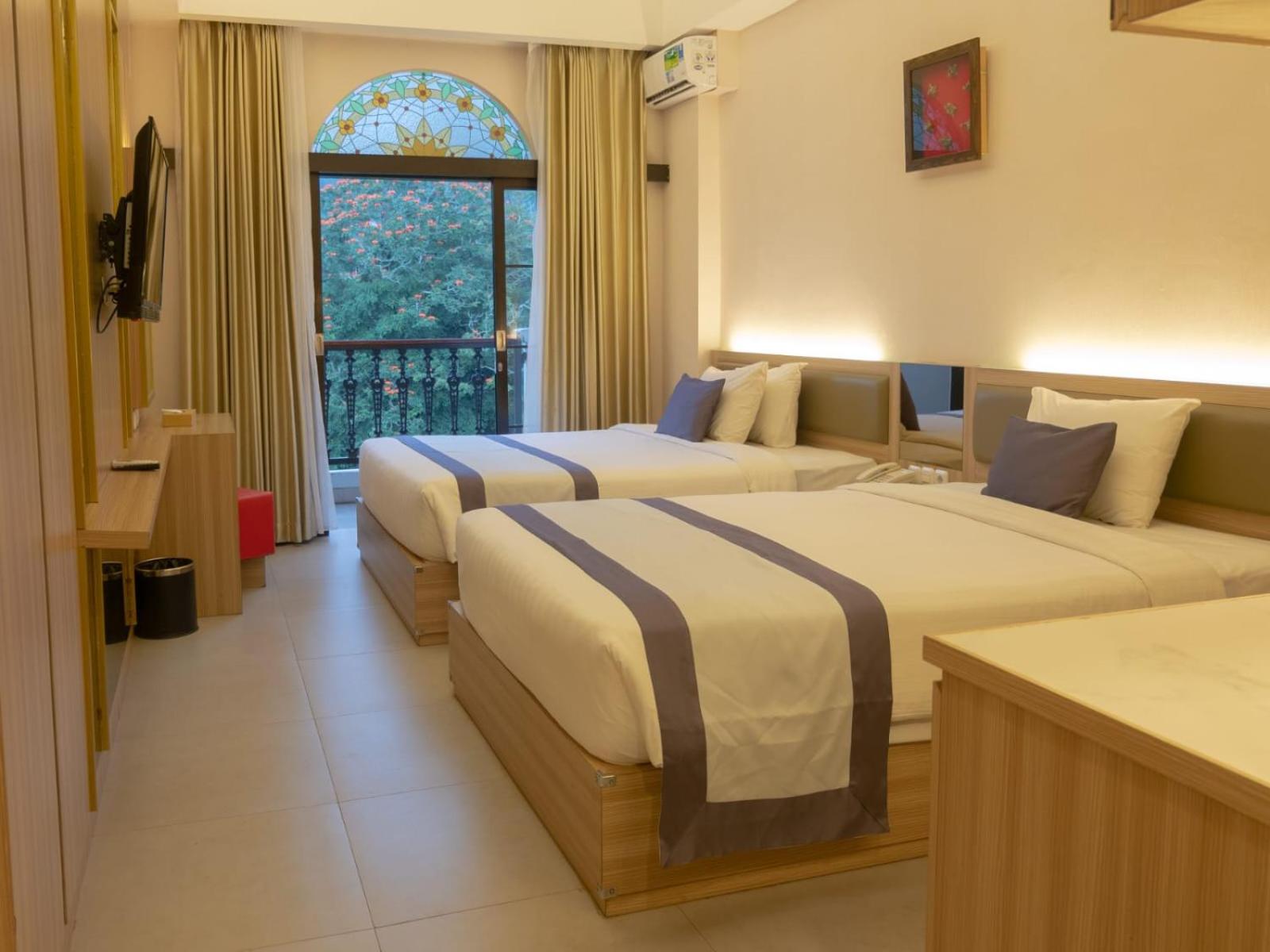 غرفة ديلوكس بسرير مزدوج أو سريرين منفصلين بشرفة