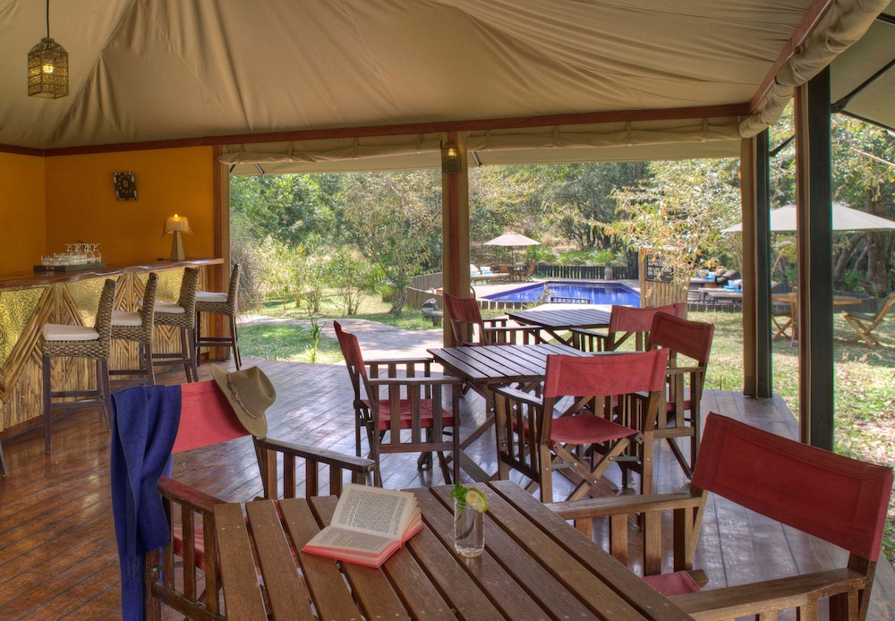 OLARE MARA KEMPINSKI MASAI MARA 36/50