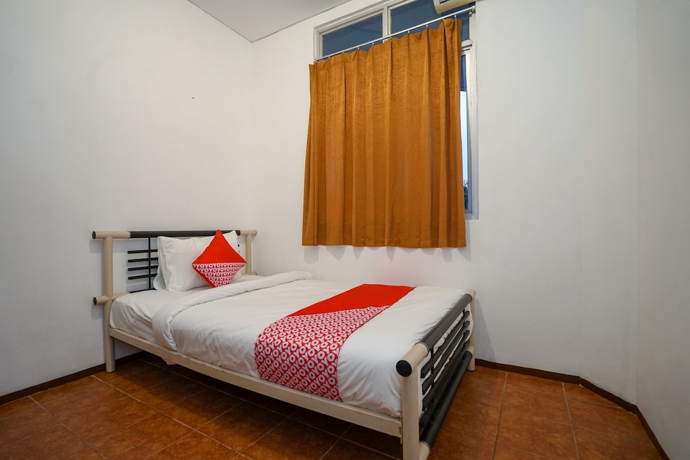 Super OYO 1844 Bravo Residence 20/39