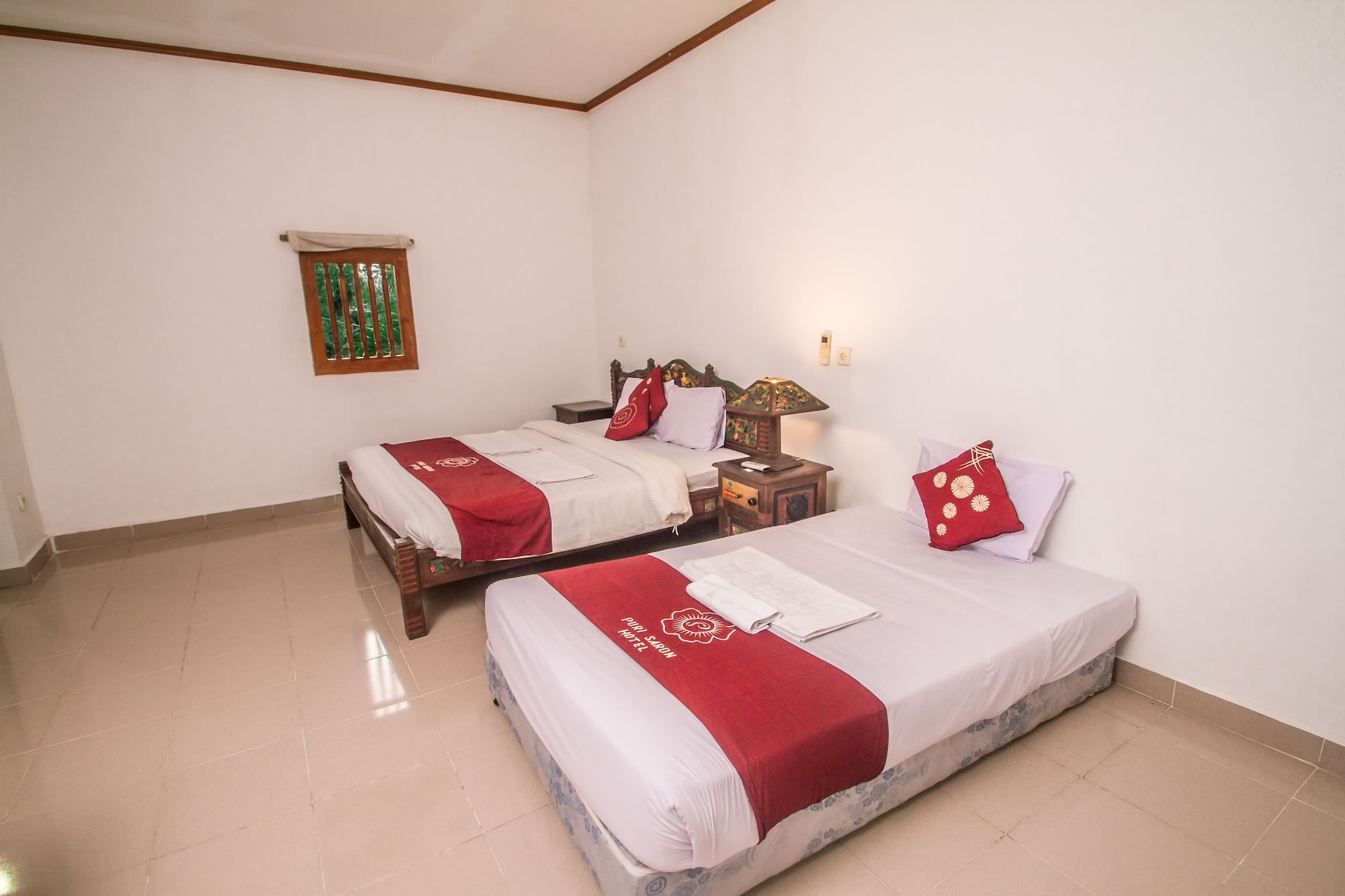 غرفة ديلوكس ثلاثية بسرير كوين وسرير فردي، Puri Saron Madangan Hotel 2/10