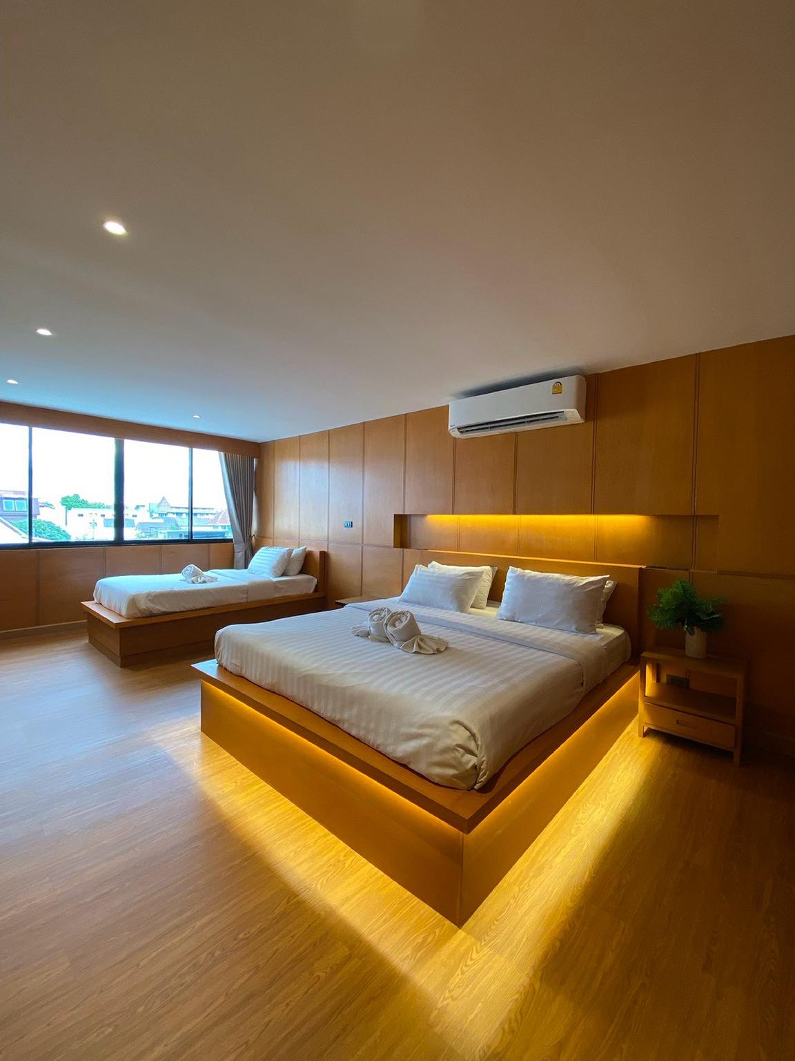 Urban, Family, 1 King and 1 Single Beds, City View, Sofa