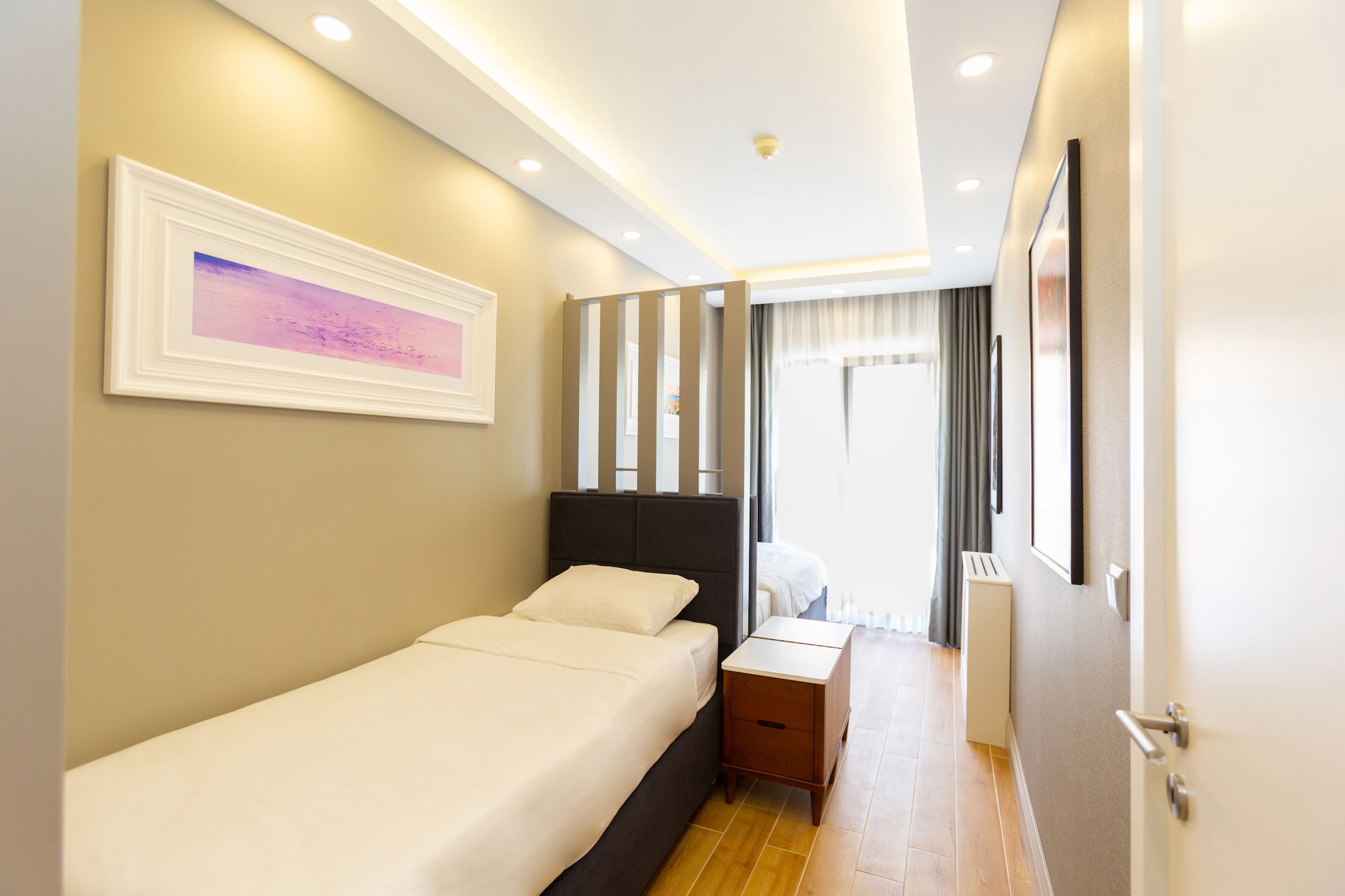 Executive, Suite, 1 King and 1 Single Beds, Sofa