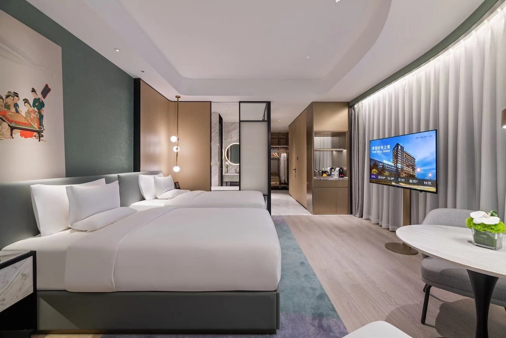غرفة ديلوكس بسريرين منفصلين، Novotel Shanghai Wanyuan 3/6