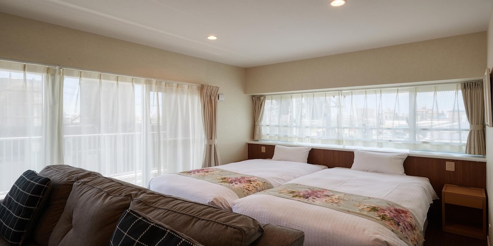 غرفة قياسية بسريرين منفصلين مع أريكة، Seaside Condominium Rana Chatan 3/10