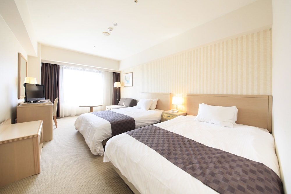 DELUXE, TWIN BEDS, SMOKING
