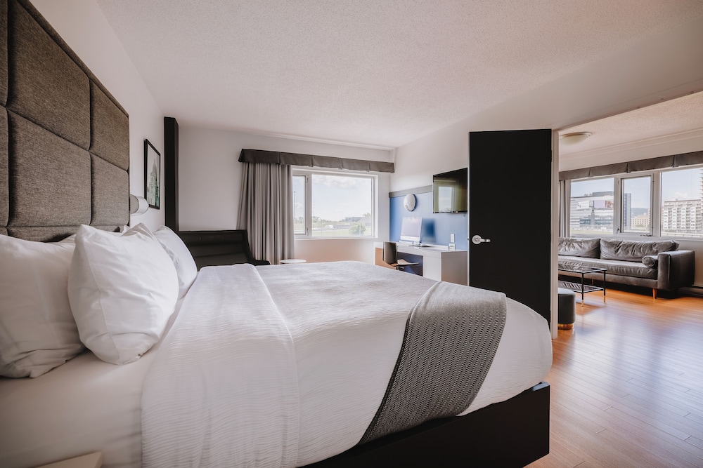 جناح ديلوكس بسرير كينج، Hotel Le Dauphin Montreal Longueuil 3/5