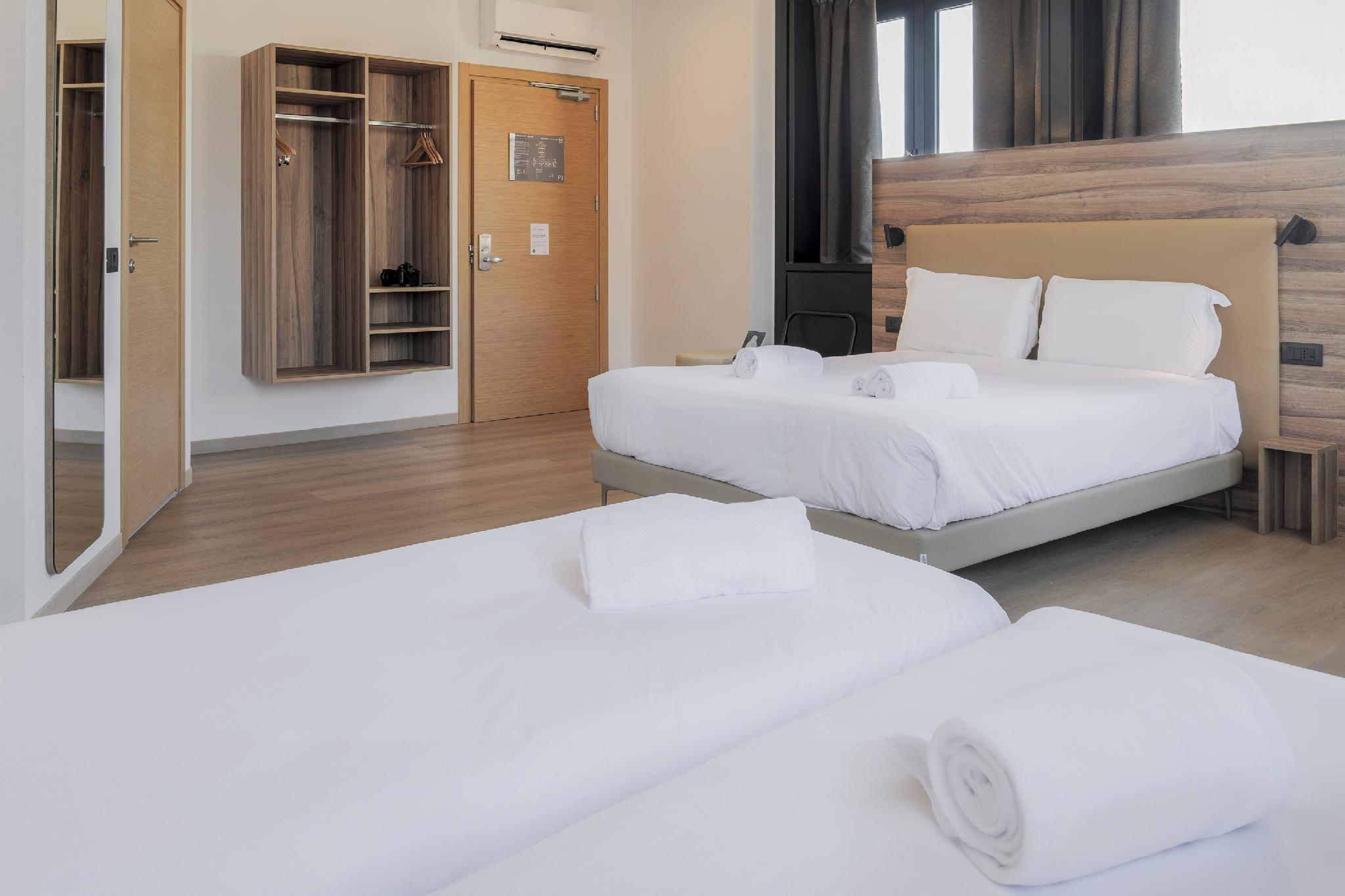 Camera Quadrupla، B&B HOTEL Prato City Center 2/2