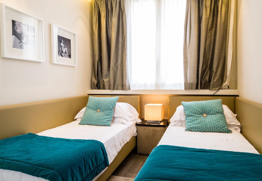 شقة فاخرة بسريرين كوين بغرفتي نوم مع أريكة، Residence Charming Apartments 5/10