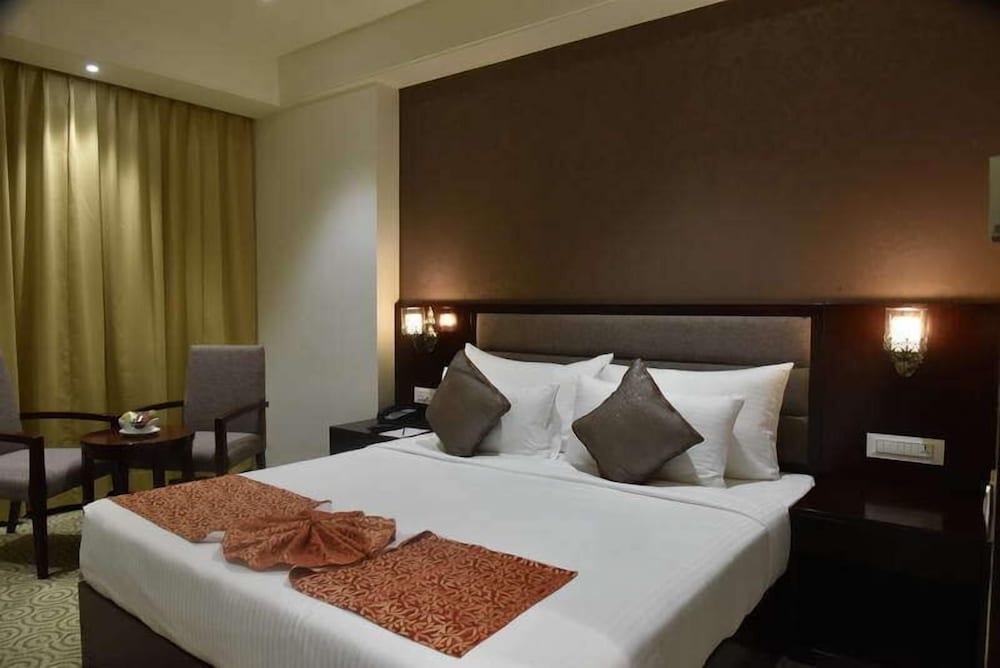 غرفة ديلوكس بسرير كينج، Pride Hotel And Convention Centre 3/10