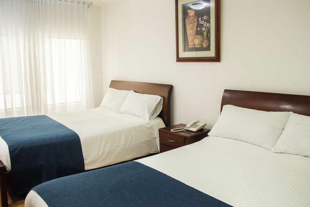 غرفة بسريرين كوين، Nogal Suite Hotel Pasto 6/8