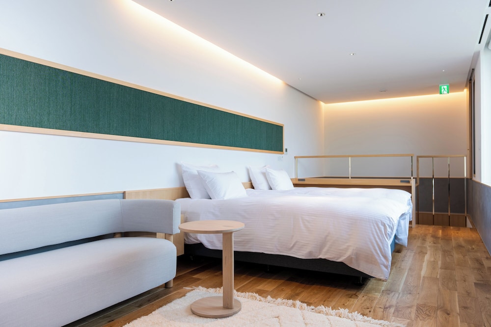 غرفة فاخرة بسريرين منفصلين بشرفة بحوض استحمام، Hotel Kitanoya 4/8
