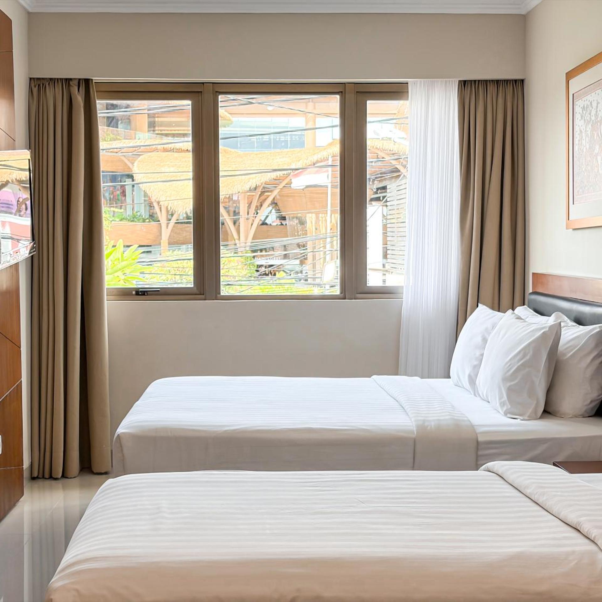 غرفة عائلية بسرير فردي، Svarna Hotel Sanur 3/7