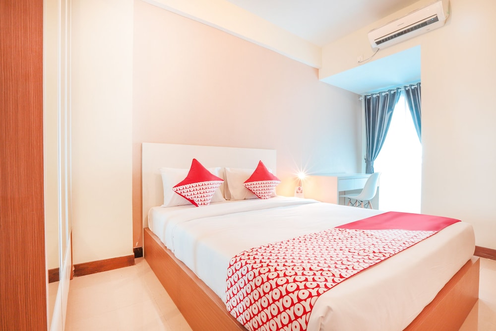 OYO Flagship 755 Appartel Grand Dhika City 10/39