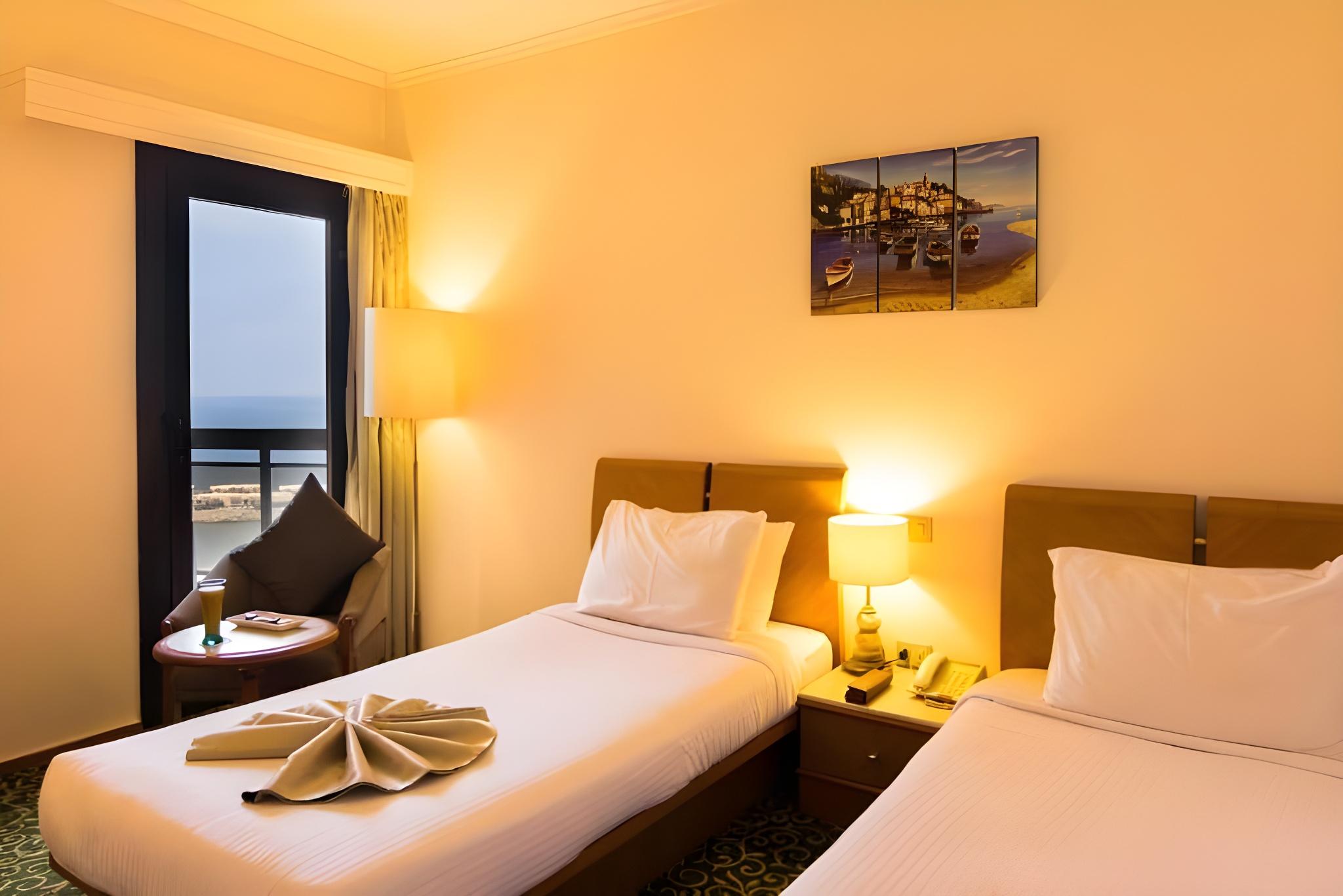 Room, 2 Double Beds, Lateral Side Sea View