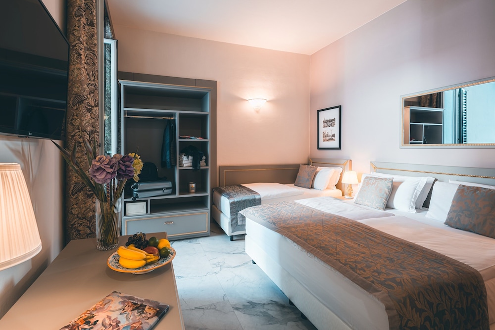 غرفة كلاسيكية ثلاثية بثلاثة أسرّة، Hotel Palazzo Benci 5/10