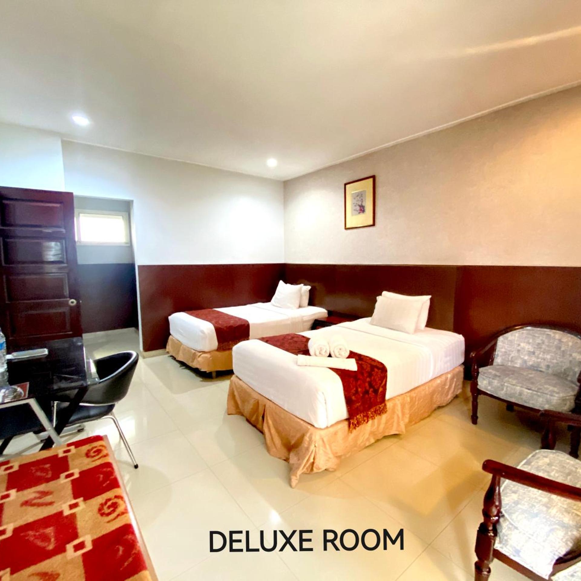 غرفة ديلوكس بسرير مزدوج أو سريرين منفصلين، Rudang Berastagi Hotel and Resort 3/8