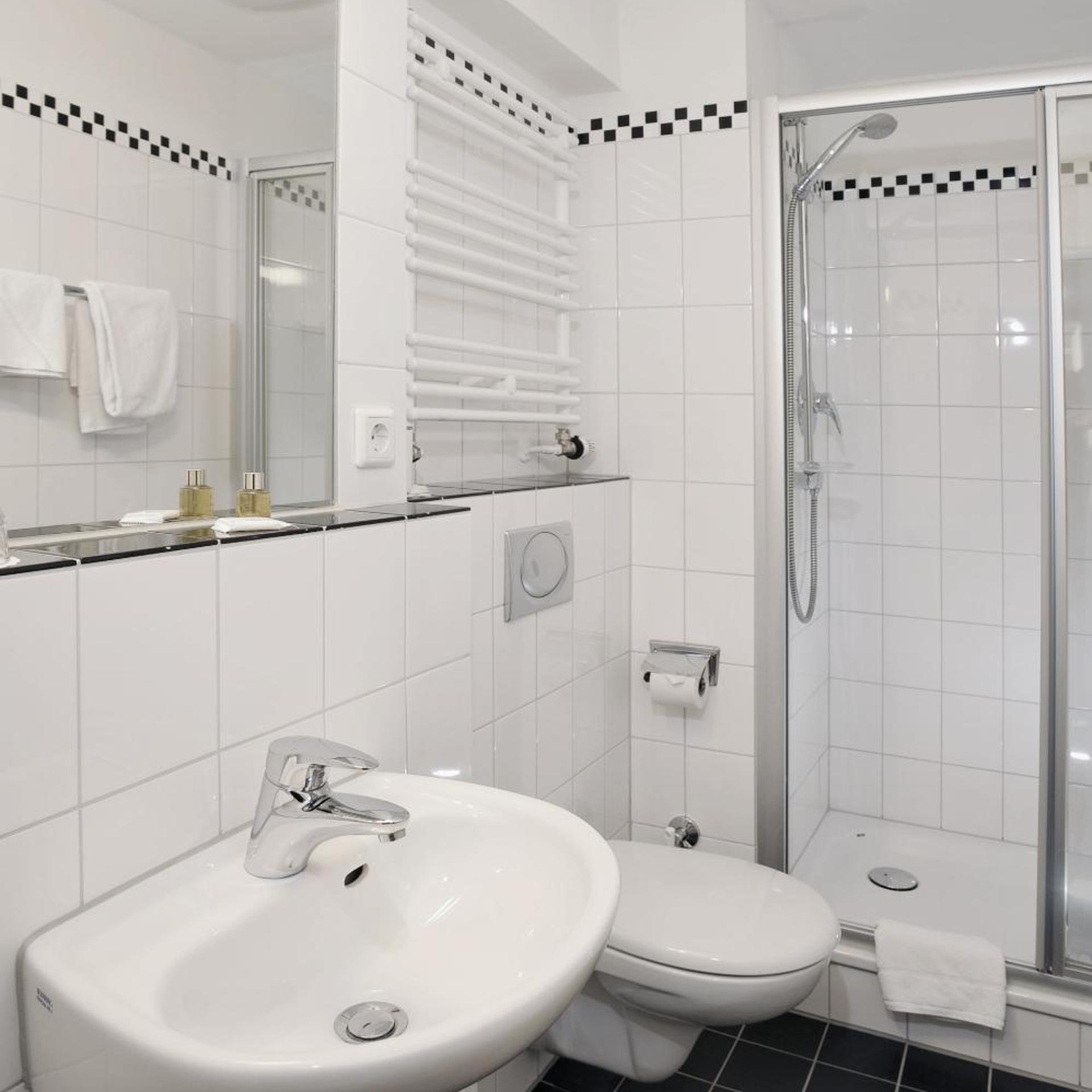 غرفة بسرير مزدوج أو سريرين منفصلين، Cityhotel Monopol 6/7