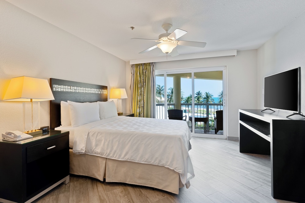 1 Bedroom King Suite Ocean View - Plus Sleeper Sofa، The Grand Caymanian Resort 6/9