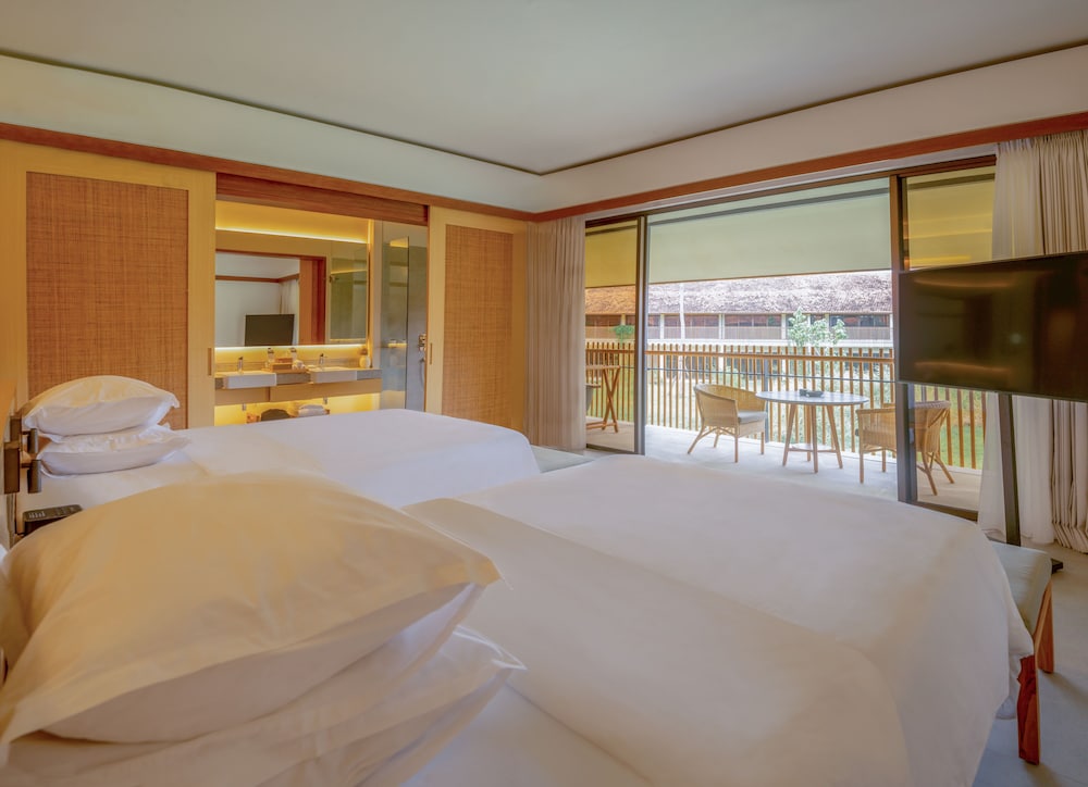 غرفة بسريرين منفصلين بإطلالة على الحديقة بشرفة، Sheraton Belitung Resort 4/11