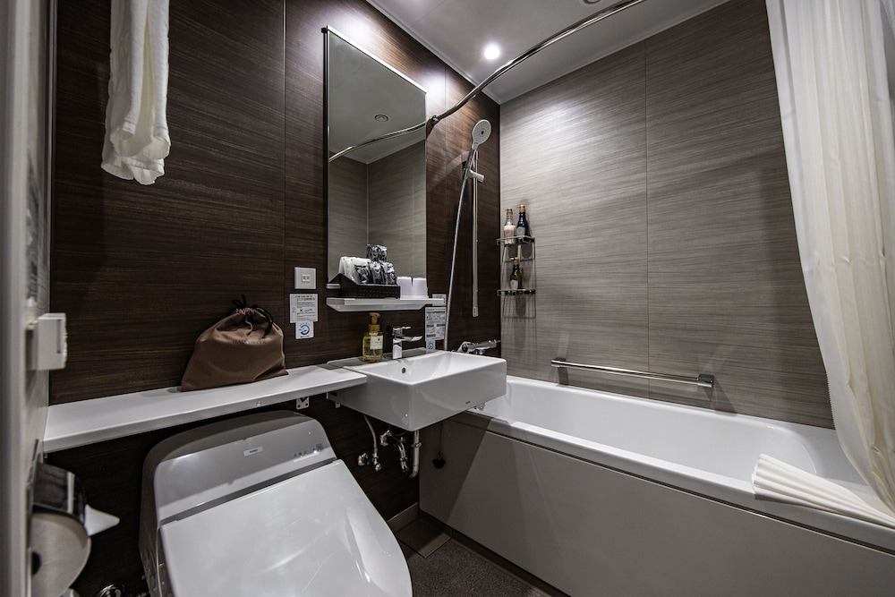 غرفة مع سرير سحّاب إضافي في المبنى الرئيسي، Hotel Trad Hakata 2/2