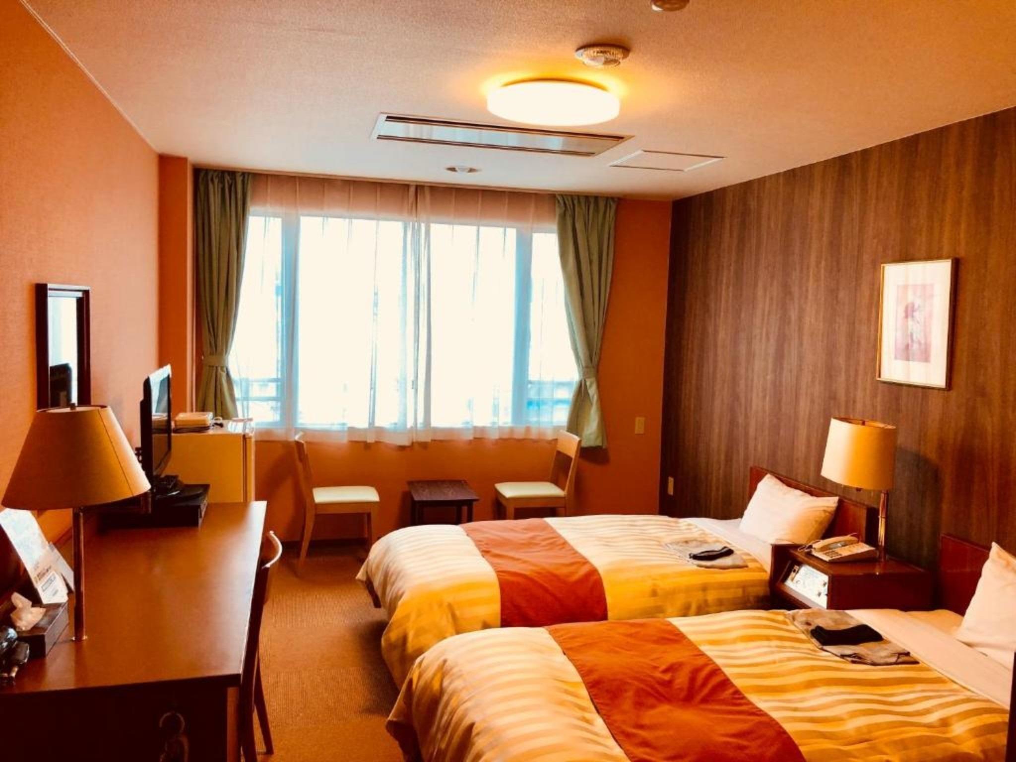 Cross, Twin Beds