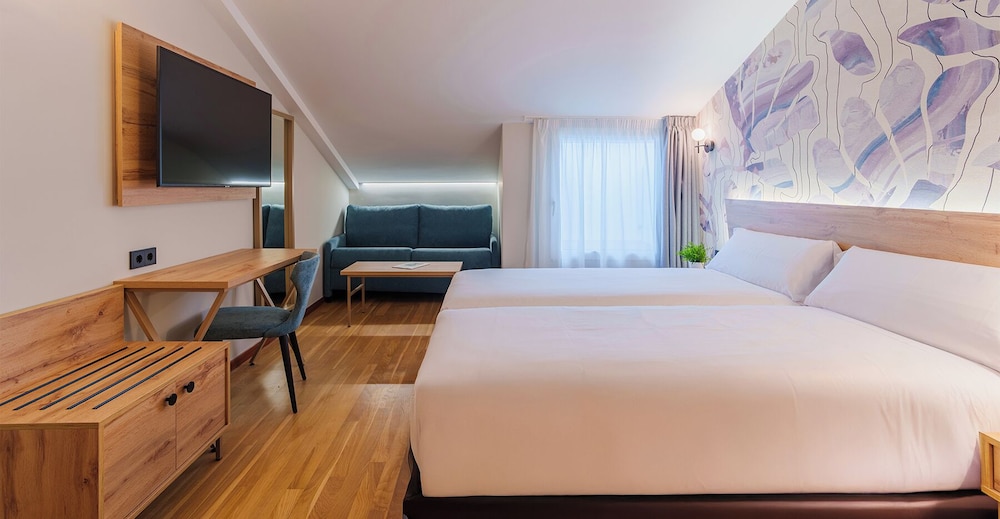 Family, 1 Double and 3 Single Beds