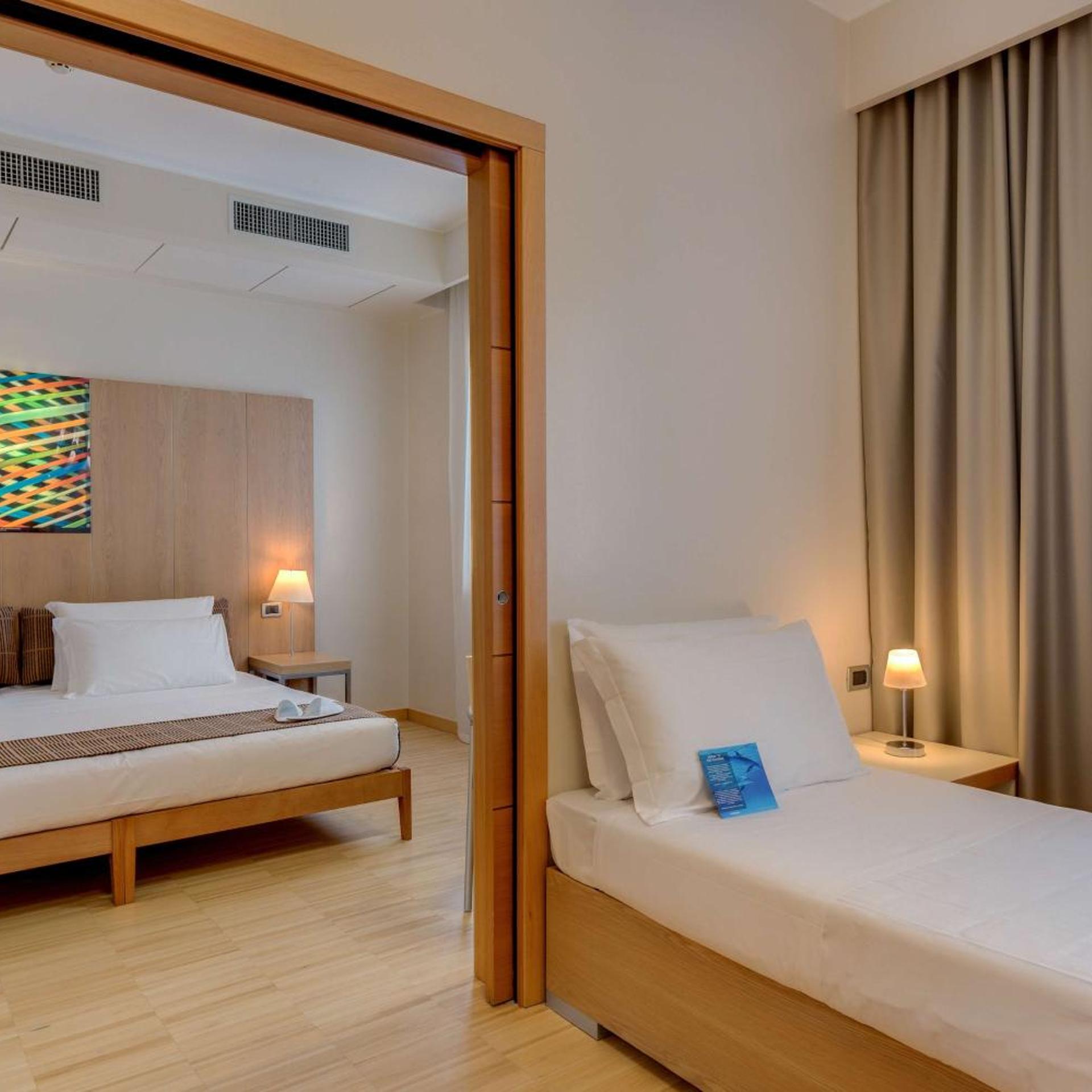 غرفة كلاسيكية بسرير فردي وسرير كوين، Best Western Plus Hotel Bologna 5/11