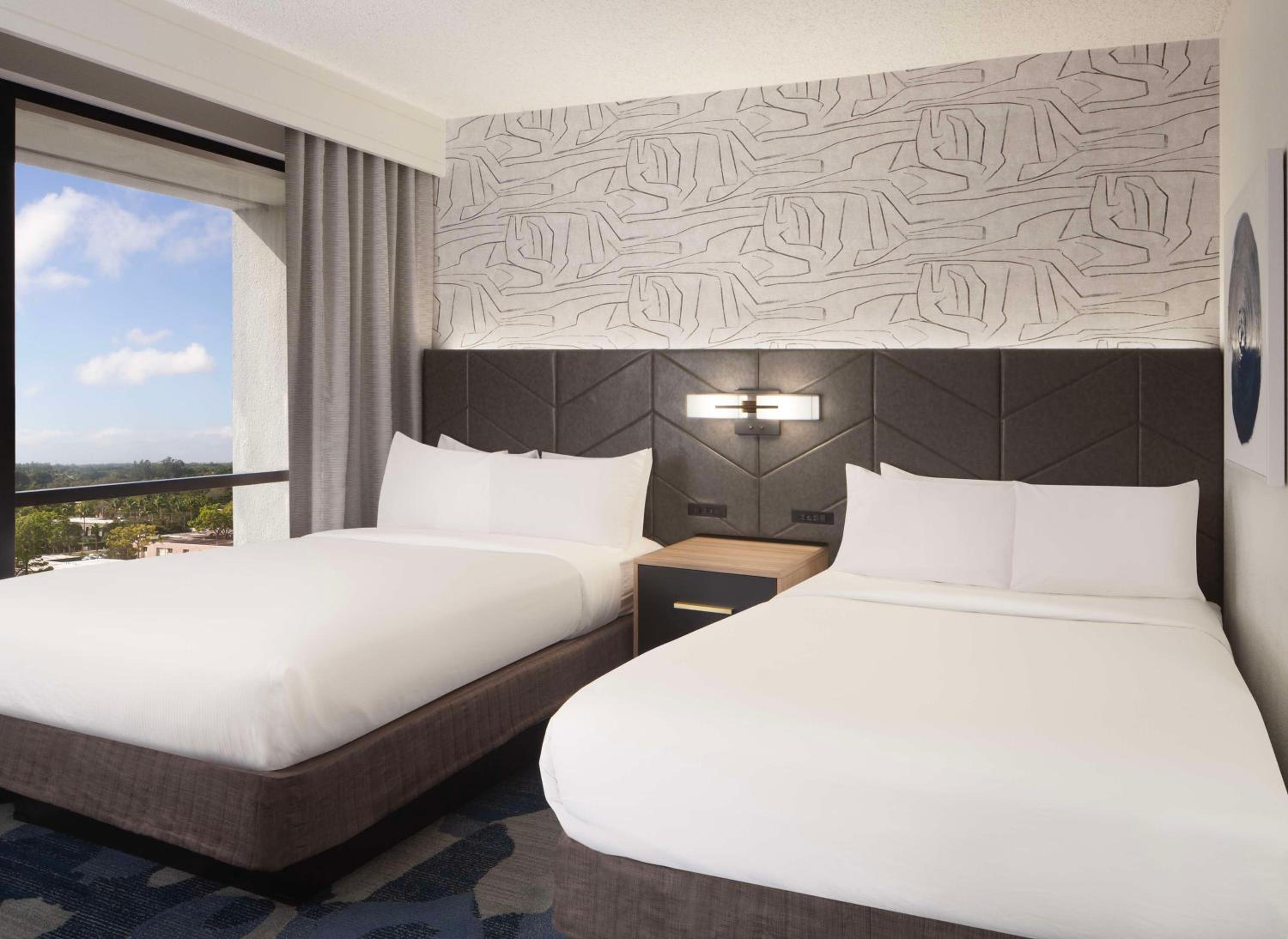 جناح بسريرين مزدوجين مع أريكة