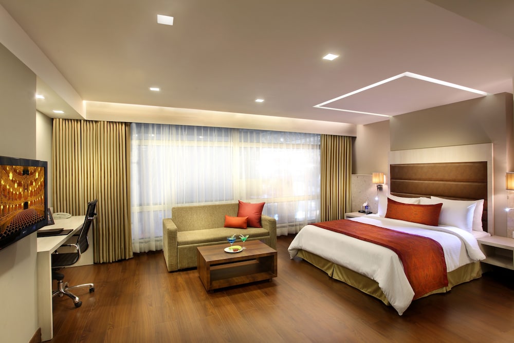 Mahagun Sarovar Portico Suites 11/38