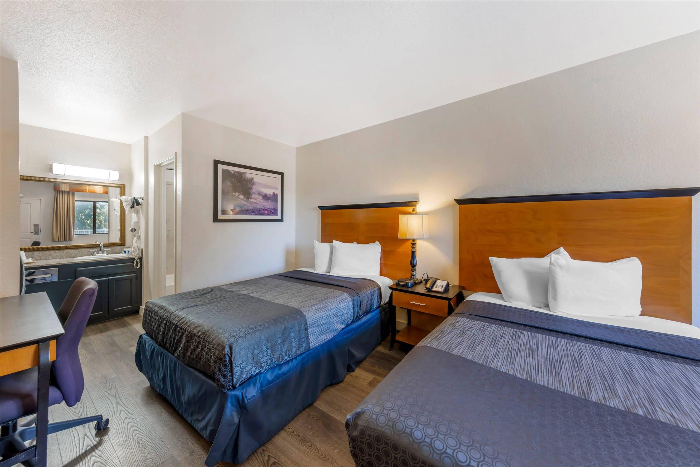 غرفة بسريرين مزدوجين، Rodeway Inn At Nevada State Capitol 2/4