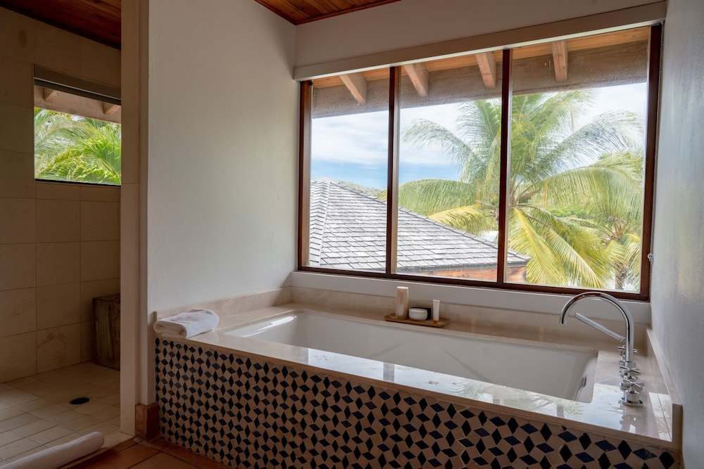 جناح جونيور بسرير كينج بإطلالة على البحر، Rosewood Little Dix Bay 7/7