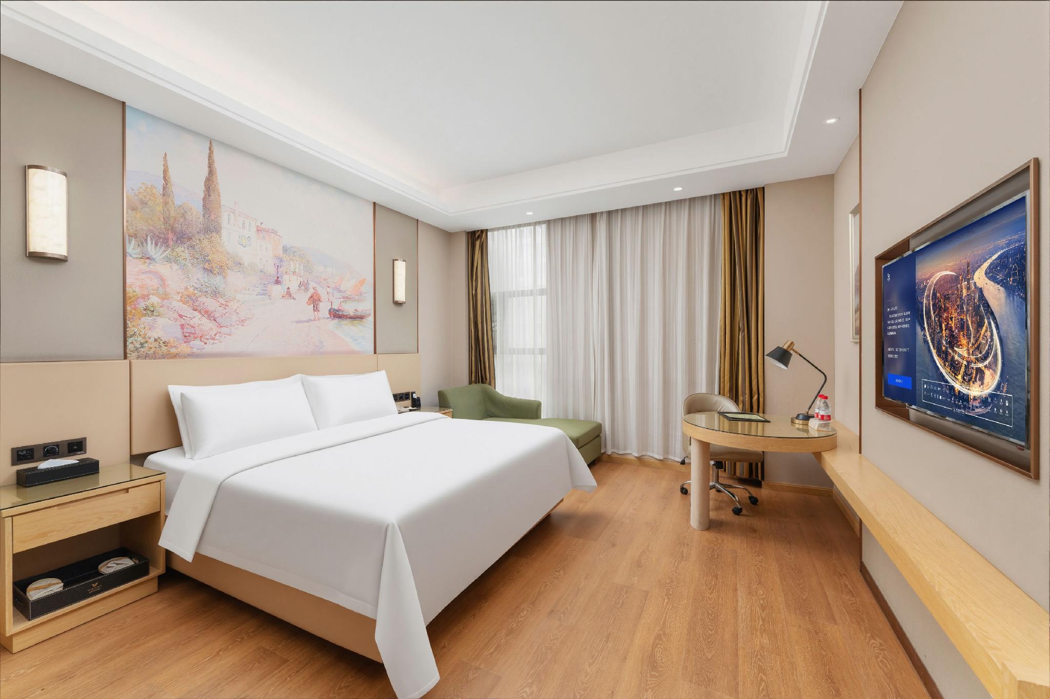 Vienna International Hotel (Huanggang Normal College Ruitian Plaza) 18/39
