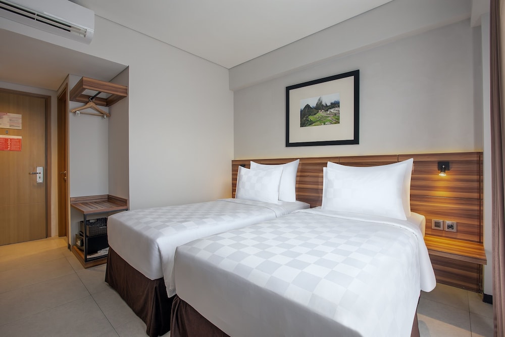 Swiss-Belinn Timika 10/41
