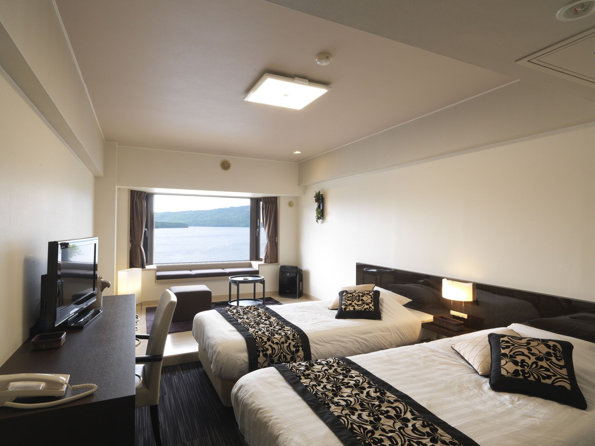 MODERATE, TWIN BEDS, LAKE VIEW