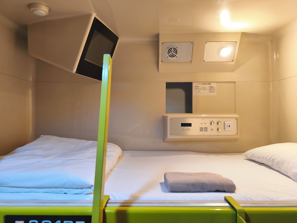 RENOVATED, CAPSULE, TWIN BEDS, SHARED BATHROOM